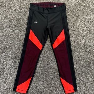 Like new Under Armour compression leggings. Black with maroon and coral accents.